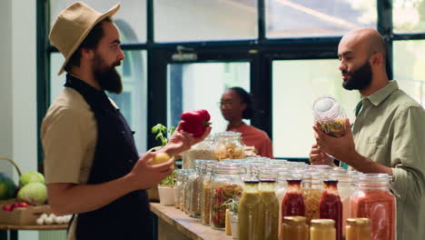 storekeeper shows bulk products to man