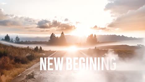 cinemagraph of new beginning text in white over misty rural sunset landscape