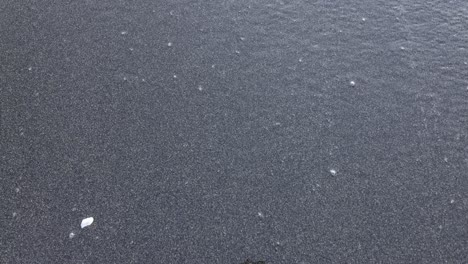 black sand and seafoam textures
