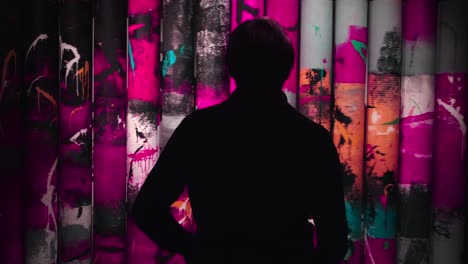 person observing abstract art installation
