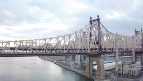 cinematic 4k aerial glide up of queensboro bridge nyc