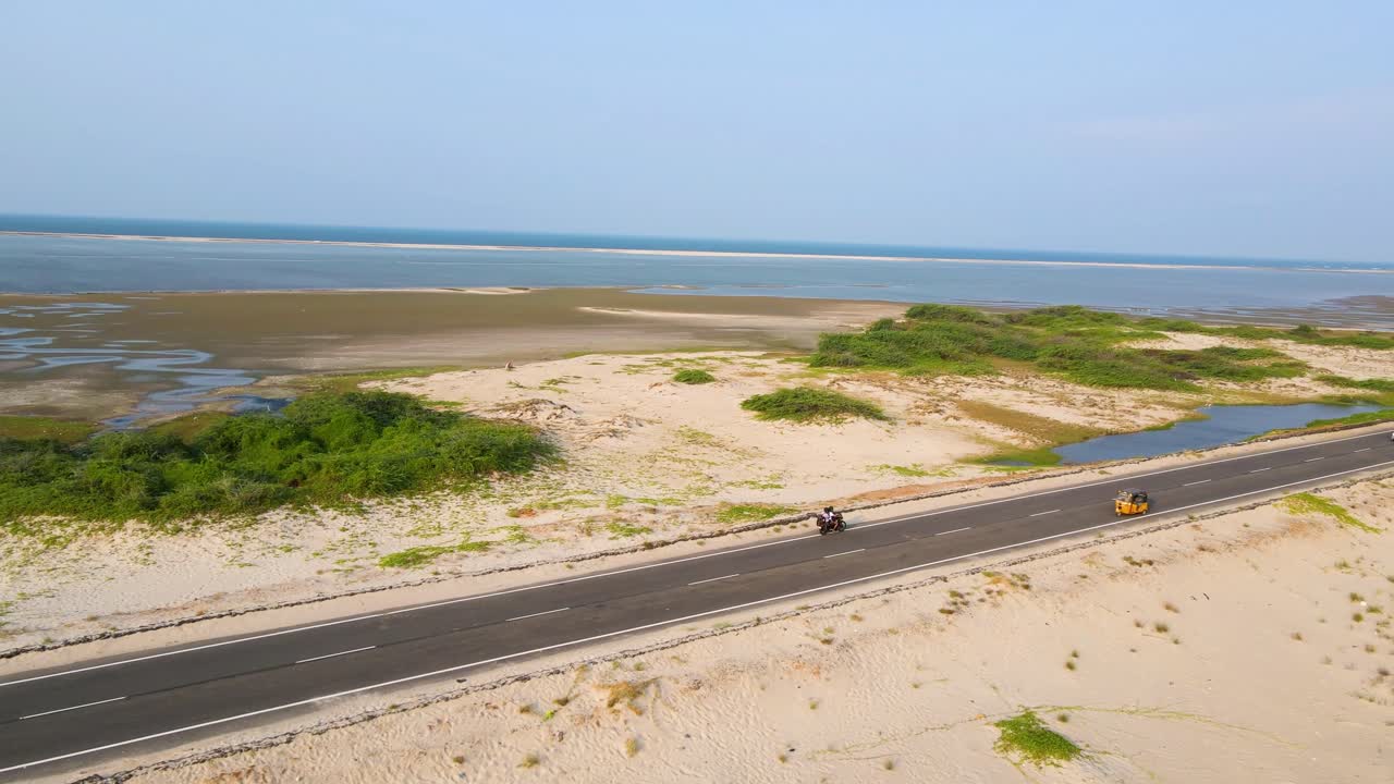 Stunning aerial drone shot of Dhanushkodi, revealing its vast sandy stretches and turquoise waters.