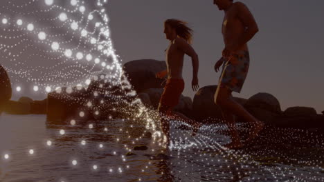 running on beach, people with glowing particles animation over water
