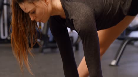 Woman-exercising-in-fitness-studio-4k