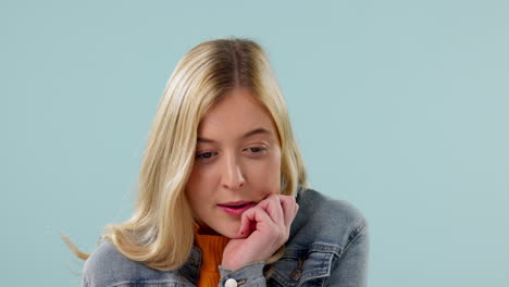 thinking, stress and woman biting nails in studio