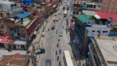 cars and bus driving in the highway through the kathmandu city in nepal