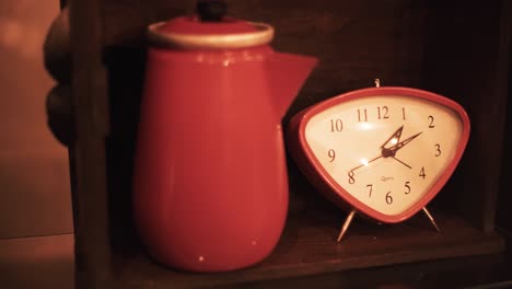 Vintage-shelf-with-ancient-coffee-pot-and-rope-watch-camera-truck-movement-4K