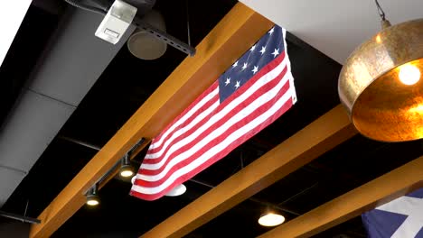 united states flag under the ceiling in 4k slow motion