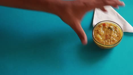 chole bhature or chick pea curry and fried puri served in terracotta crockery over white background