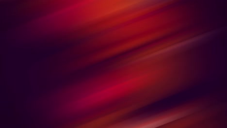 Digital-animation-of-red-and-purple-light-trails-moving-against-black-background