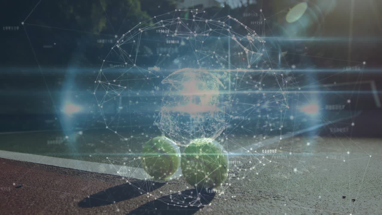 Tennis balls being visualized on court with holographic sphere of digital nodes and light streaks
