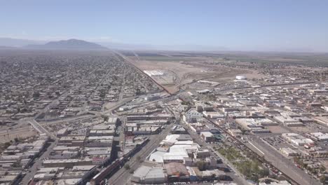 Drone-flying-to-the-right-over-a-Mexico-aside-the-border-of-the-United-States-of-America