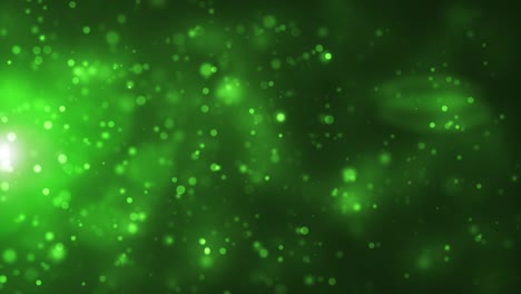 particella astratta verde animata emessa da una fonte luminosa, sfondo loopabile