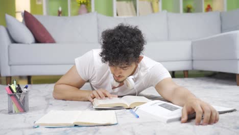 focused male student studying.