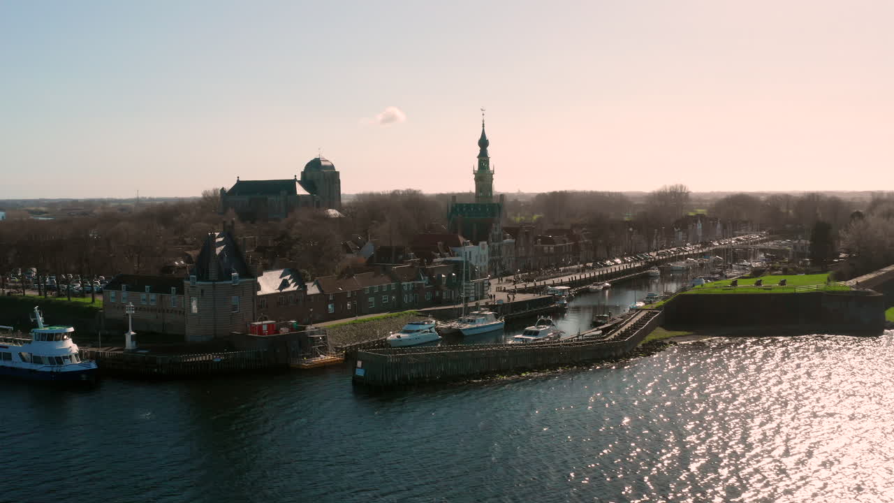 Picturesque Canal Cityscape with Boats and Historic Buildings