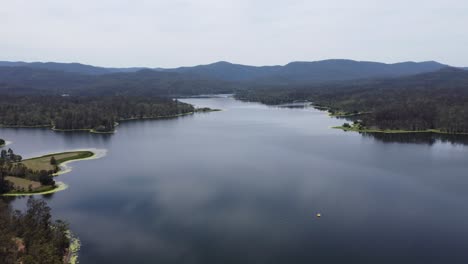 Aerial-view-of-a-beautiful-lake-with-clouds-reflection-on-the-lake