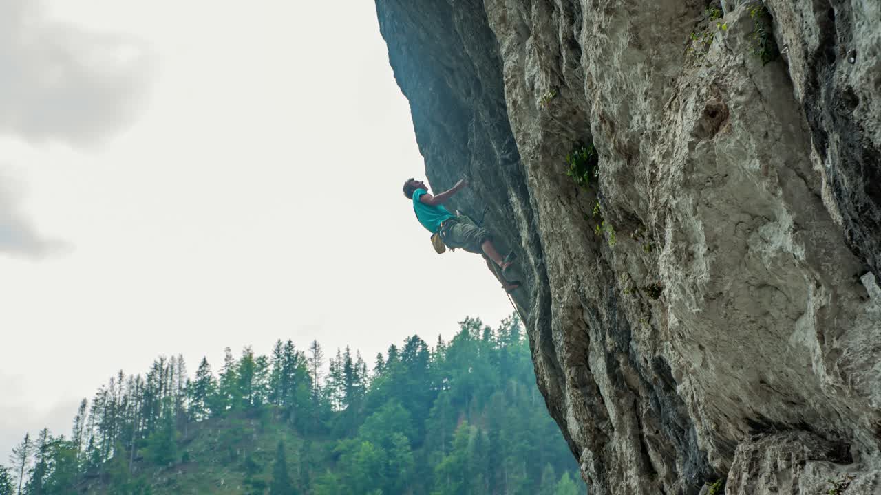 Solo Free Climber Scrambling Up Natural Rock Formation. Topla, Slovenia