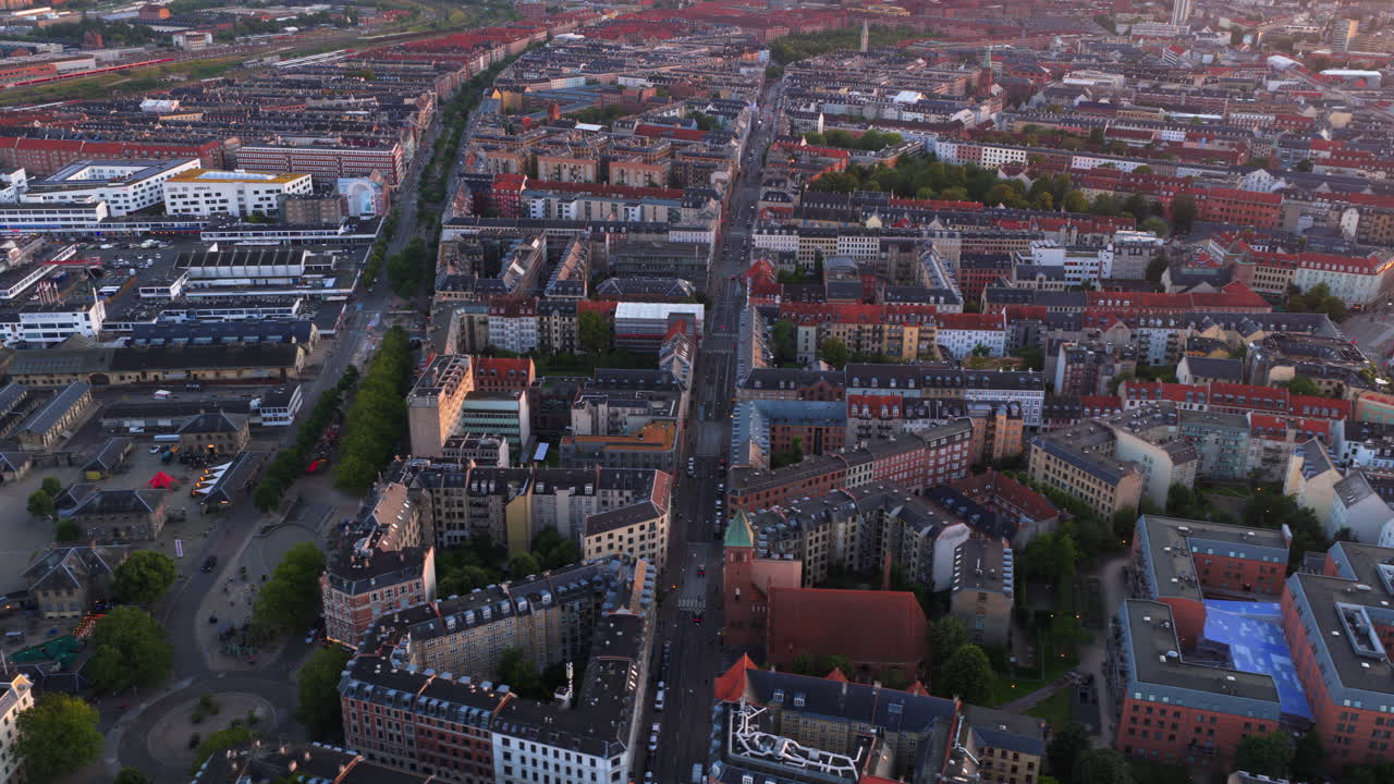 Aerial drone view of Vesterbro district in Copenhagen, Denmark at sunset