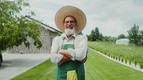 smiling senior gardener in a garden