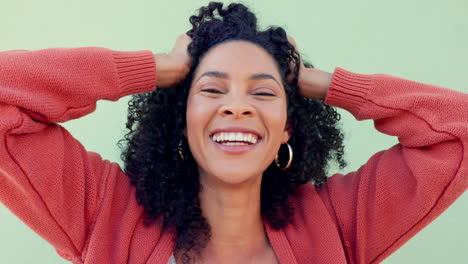 freedom, hair and fun with a young woman playing