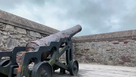 ancient canon on fortification wall; canon on castle