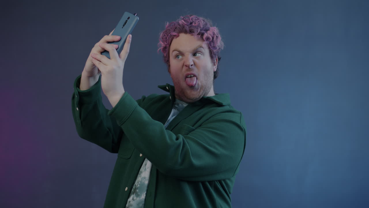 Man Taking a Selfie on His Smartphone