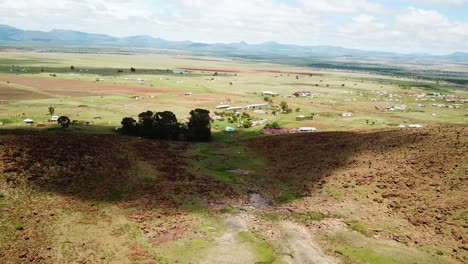 aerial over african village and landscape in the south africa eastern cape region of bilatya