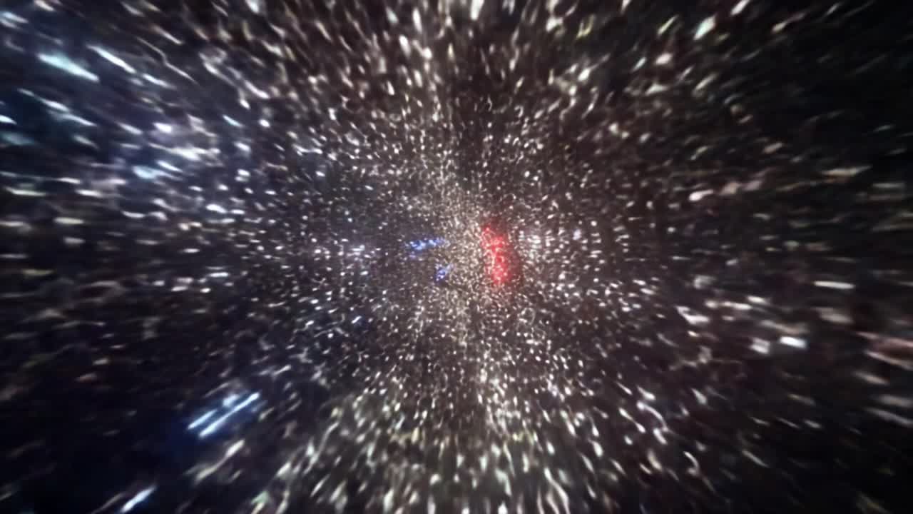 Un asombroso viaje visual por el espacio: partículas vibrantes se dispersan sobre un fondo cósmico en dinámicas corrientes rojas y azules, mostrando la belleza del universo.
