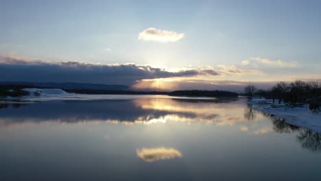 winter sunset over a frozen river