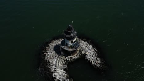 an aerial view the orient point lighthouse off the east end of orient point, ny on a sunny day