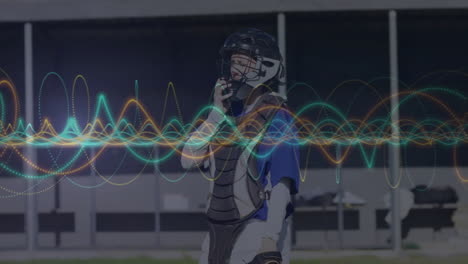 colorful sound waves animation over baseball catcher in protective gear