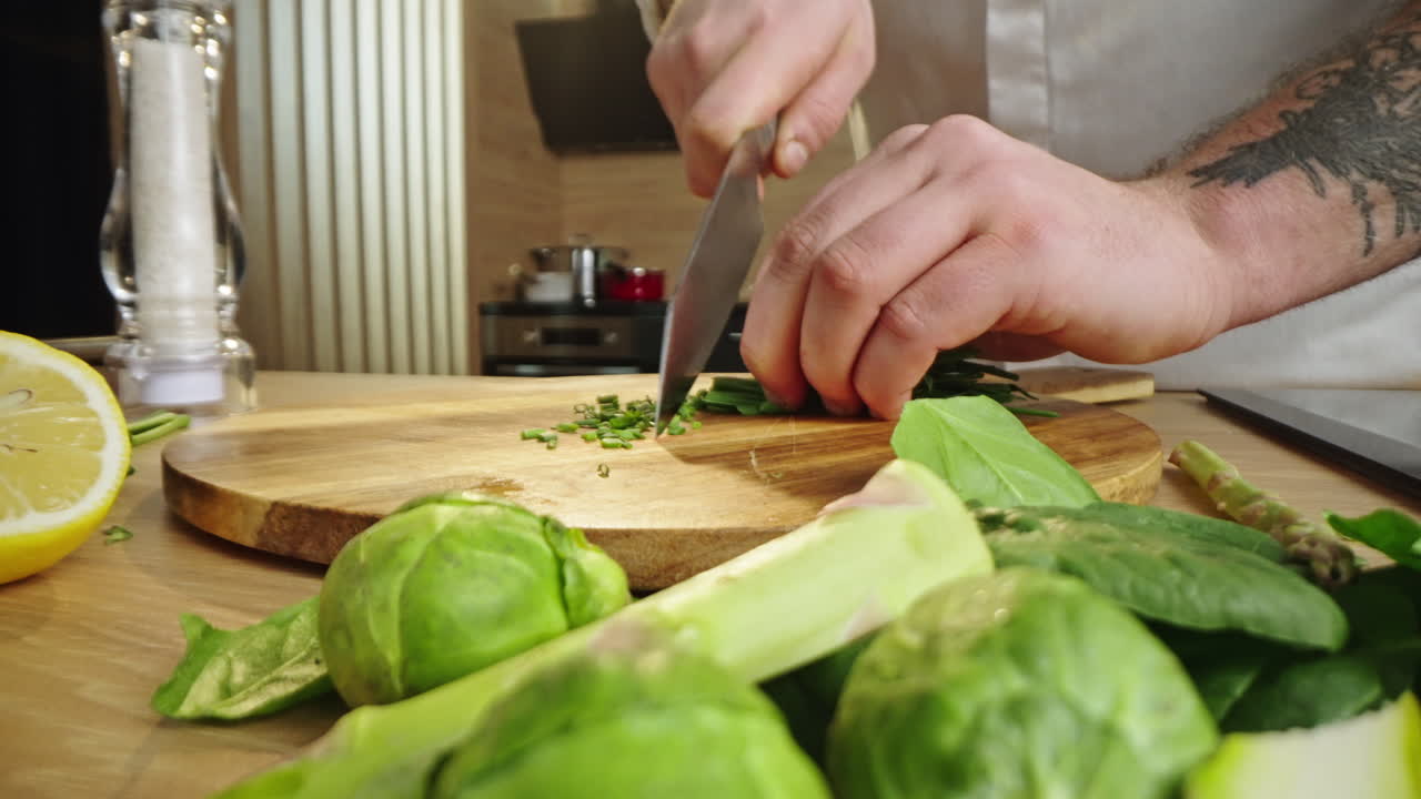 Chopping chives in the kitchen