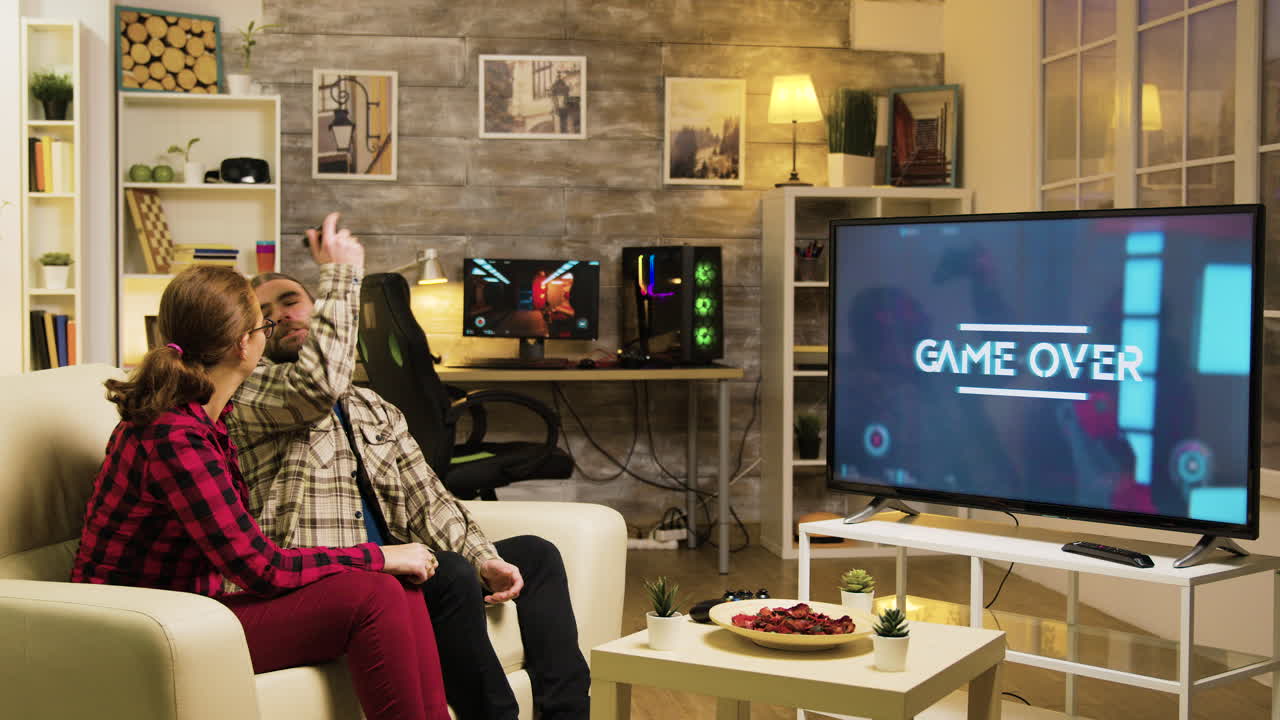 Couple Playing Video Games in Living Room