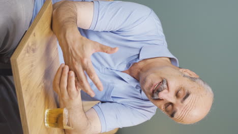 Vertical-video-of-Alcoholic-old-man-fights-with-his-wife.