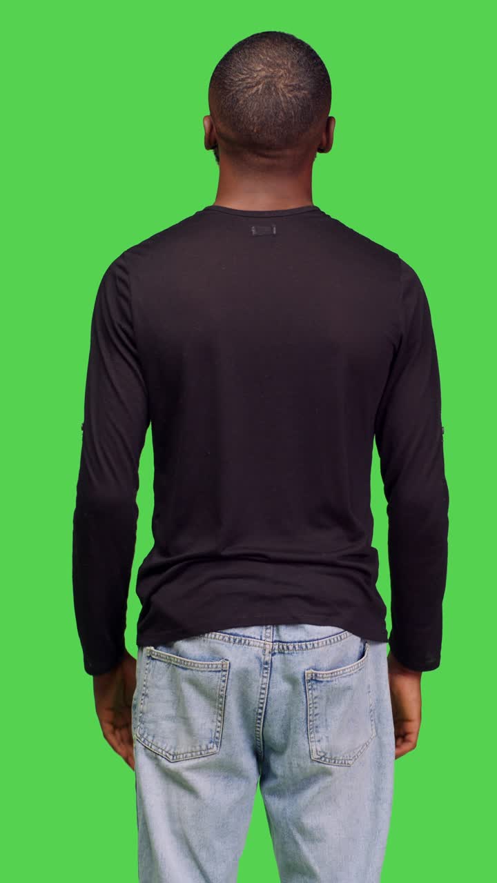 Vertical video: Back view of spiritual person praying to god in studio
