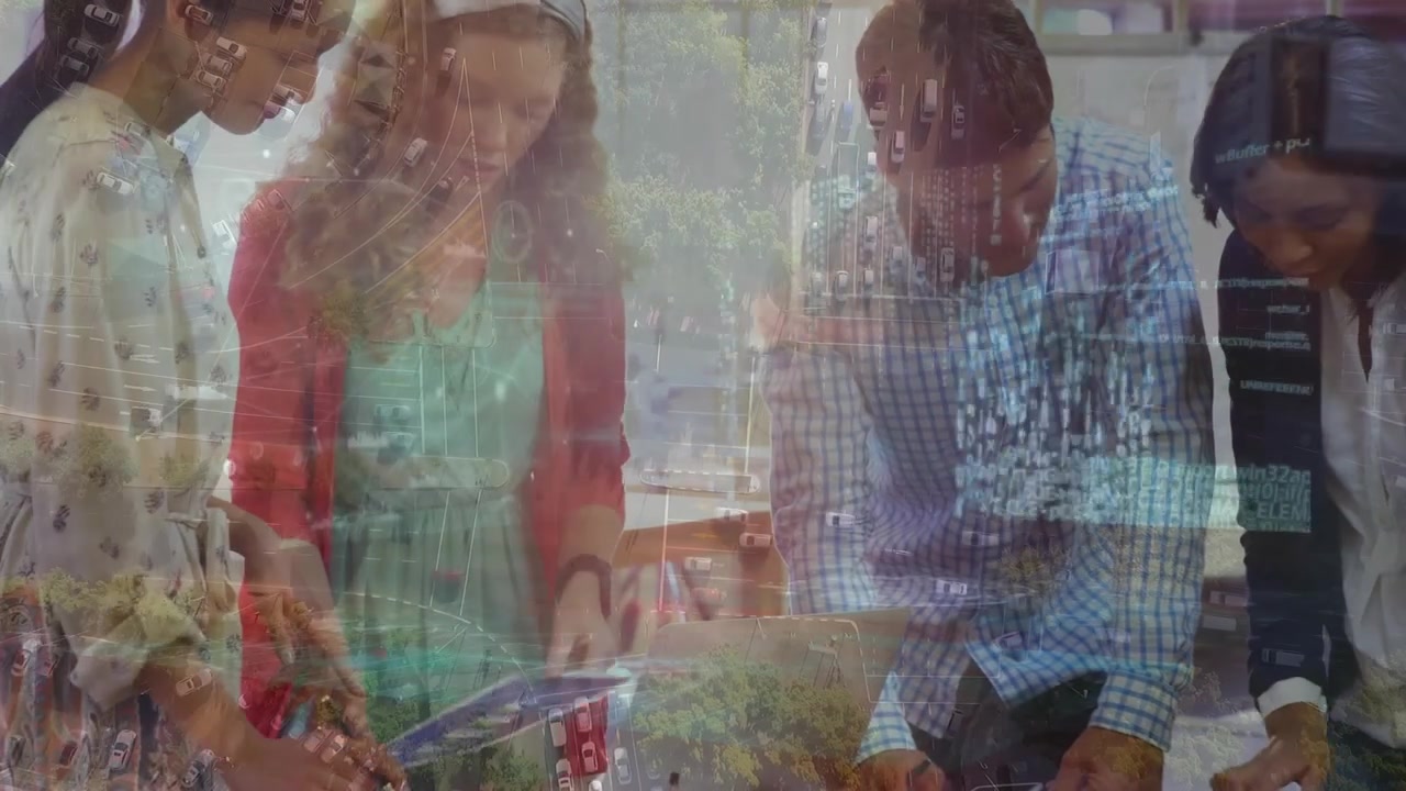 The business executives are interacting over a graph document in office