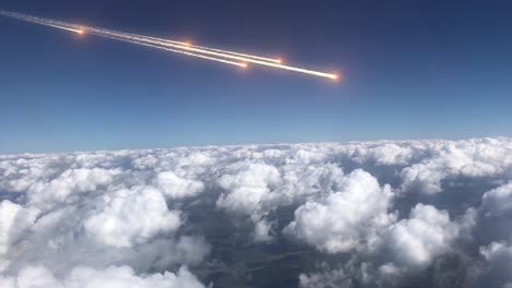 meteors streaking across the cloud layer