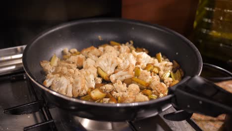 Nutritious-Cauliflower-Sauteing-In-A-Cast-iron-Pan