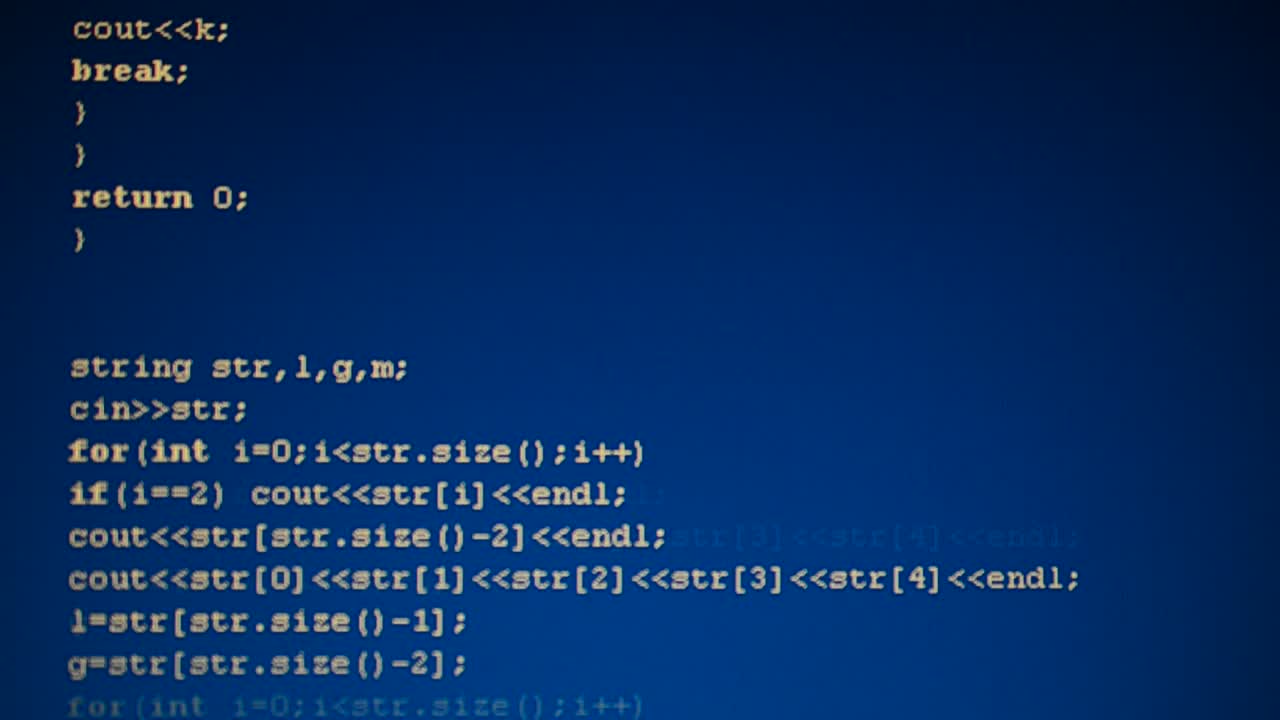 Source code on the monitor screen. Source code