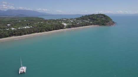 catamaran yacht on serene ocean of four mile beach, north qld, australia