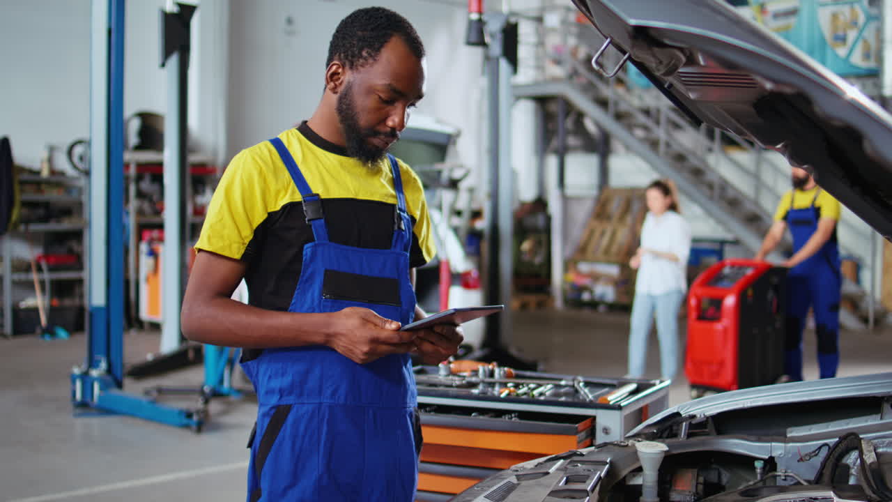 Expert does maintenance on client car