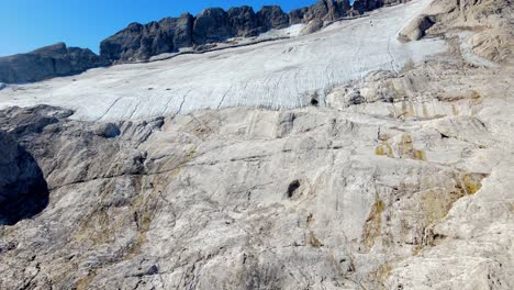 aerial views of the glacier in the north face of the marmolada mountain in the italian dolomites