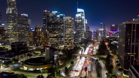 drone hyperlapse of downtown los angeles and traffic on 110 freeway