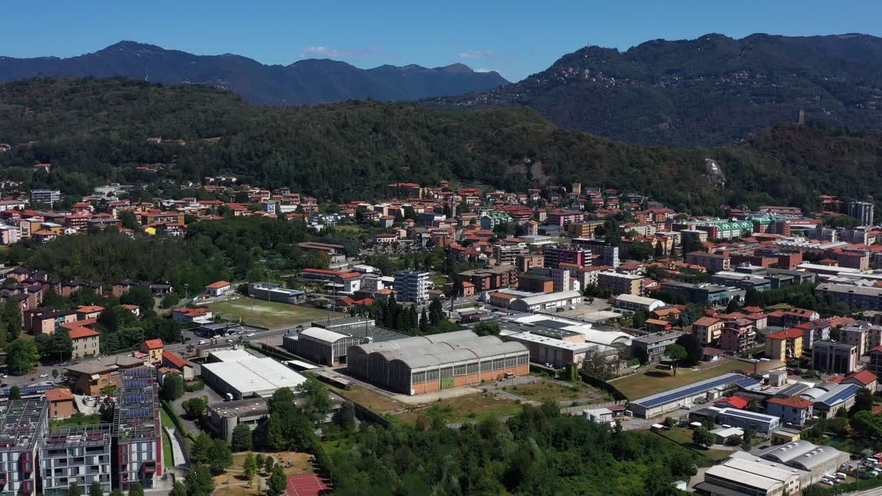 An engaging aerial overview of Via Pasquale Paoli in Como. Admire the urban structure, with buildings of various types and roads that make this area a central point for traffic and city development.
