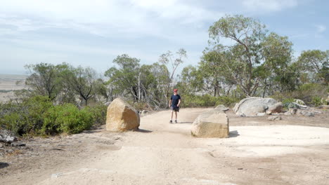 man walking up to the flinders peak