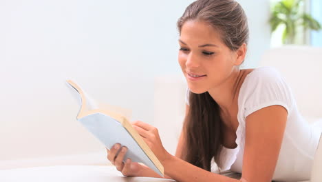 Brunette-woman-reading-a-book