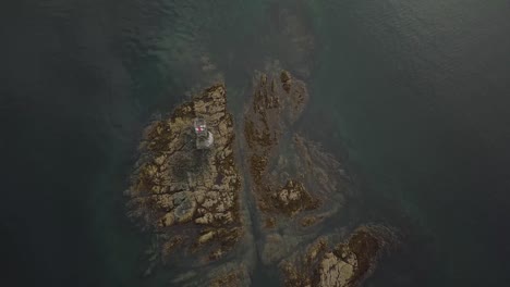 slow aerial spin from above vanderbilt reef, navigation beacon, juneau ak, lynn canal inside passage