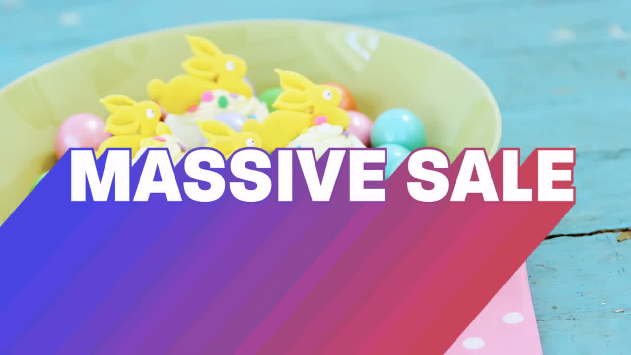 Colorful candies and yellow bunny figures with massive sale animation text