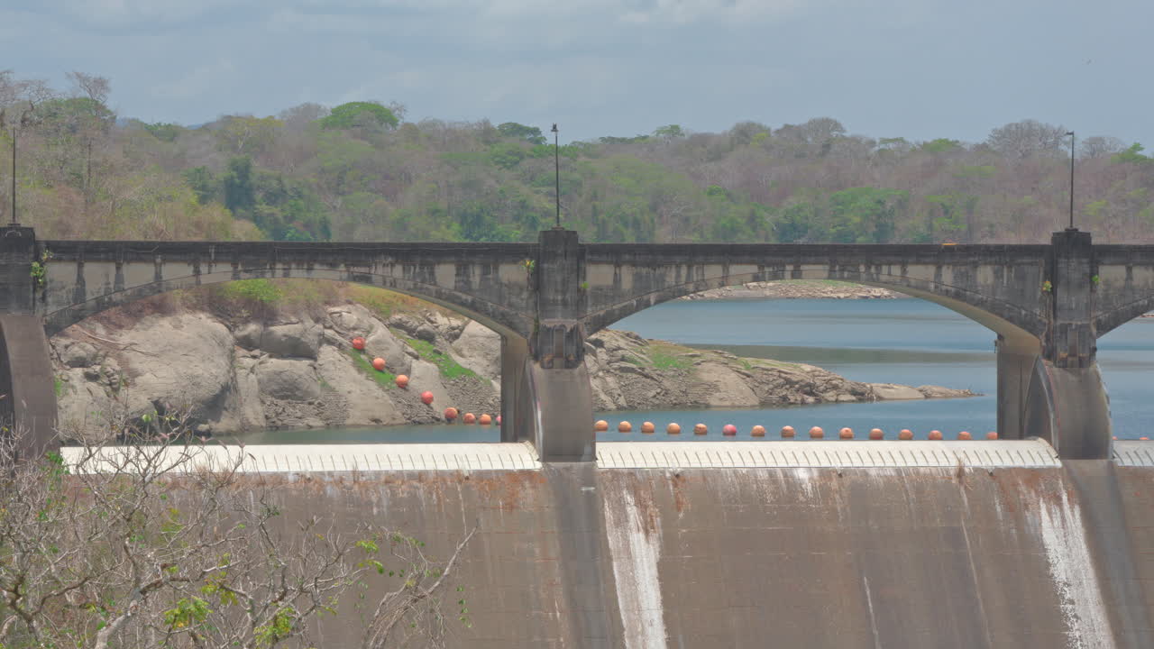 Close-up shot of Madden Dam and an empty Lake Alajuela due to drought in Panama