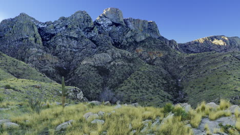 Drone-footage-flying-towards-mountain-cacti-in-Catalina-state-park-in-Arizona